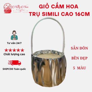 Giỏ trụ cắm hoa thiết kế có quai cầm tiện lợi, chất liệu simili da tráng gương cao cấp, sang trọng